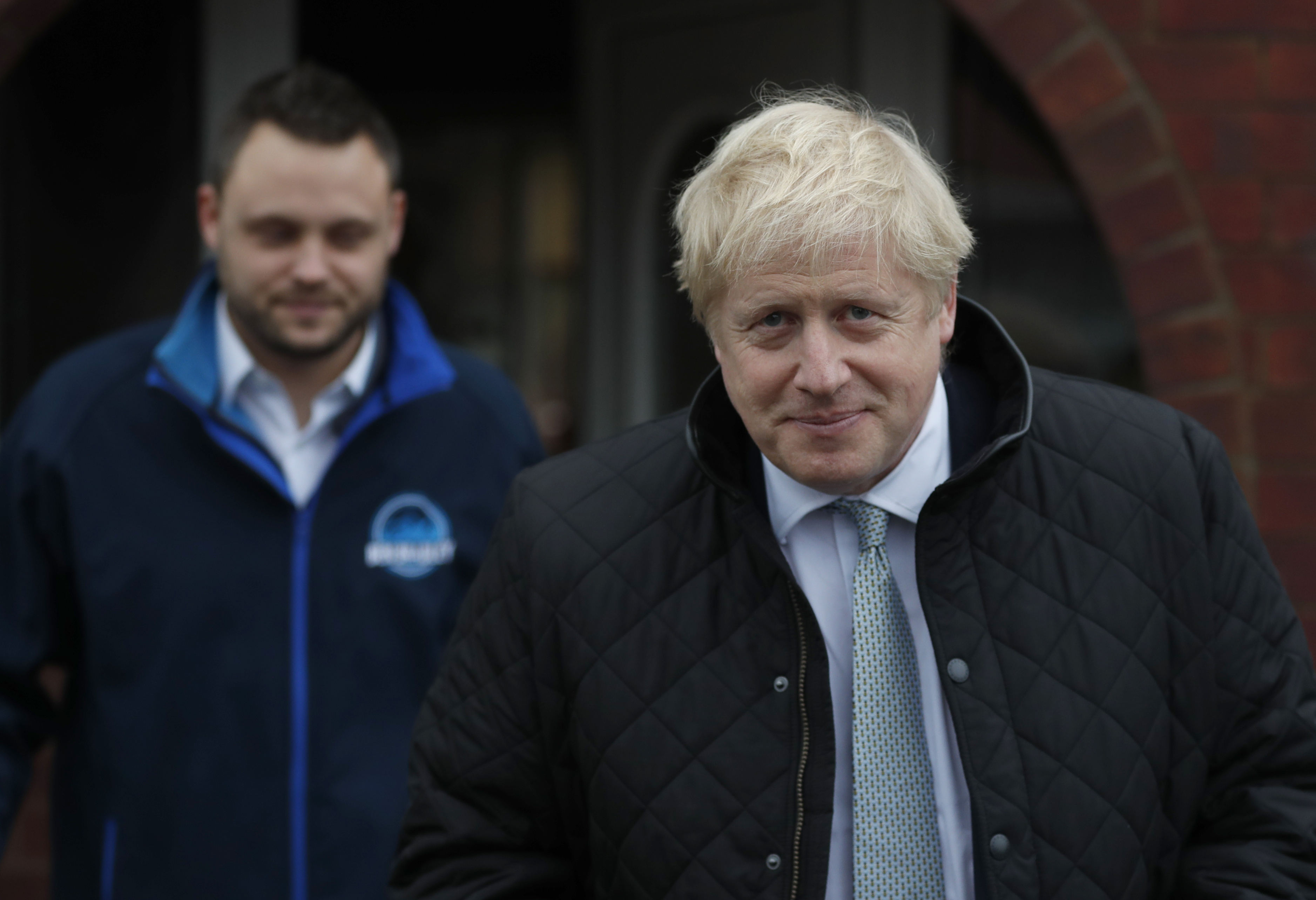 UK leader Johnson faces questions about ties to US woman