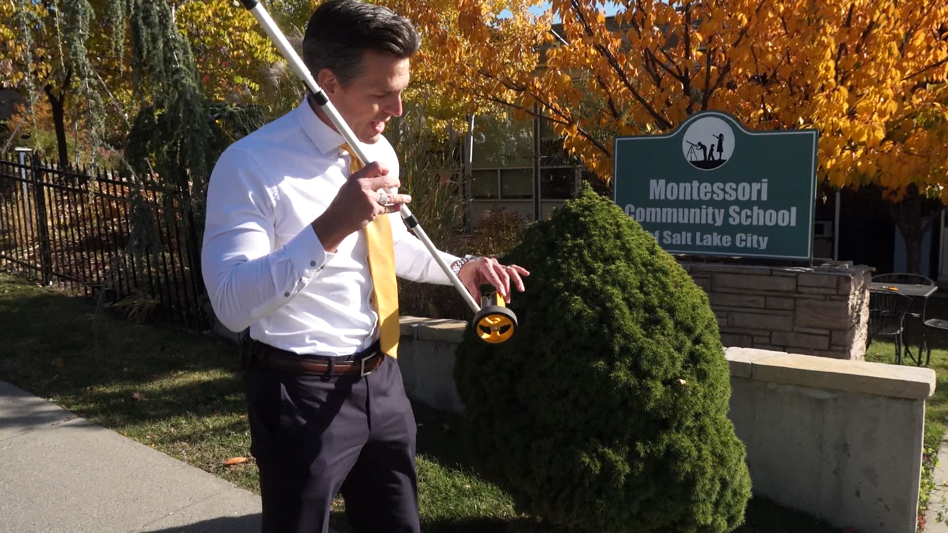 KSL Investigator Mike Headrick measured the distance between a mixed retail location and a nearby school Monday, Nov. 18, 2019. Photo: KSL TV