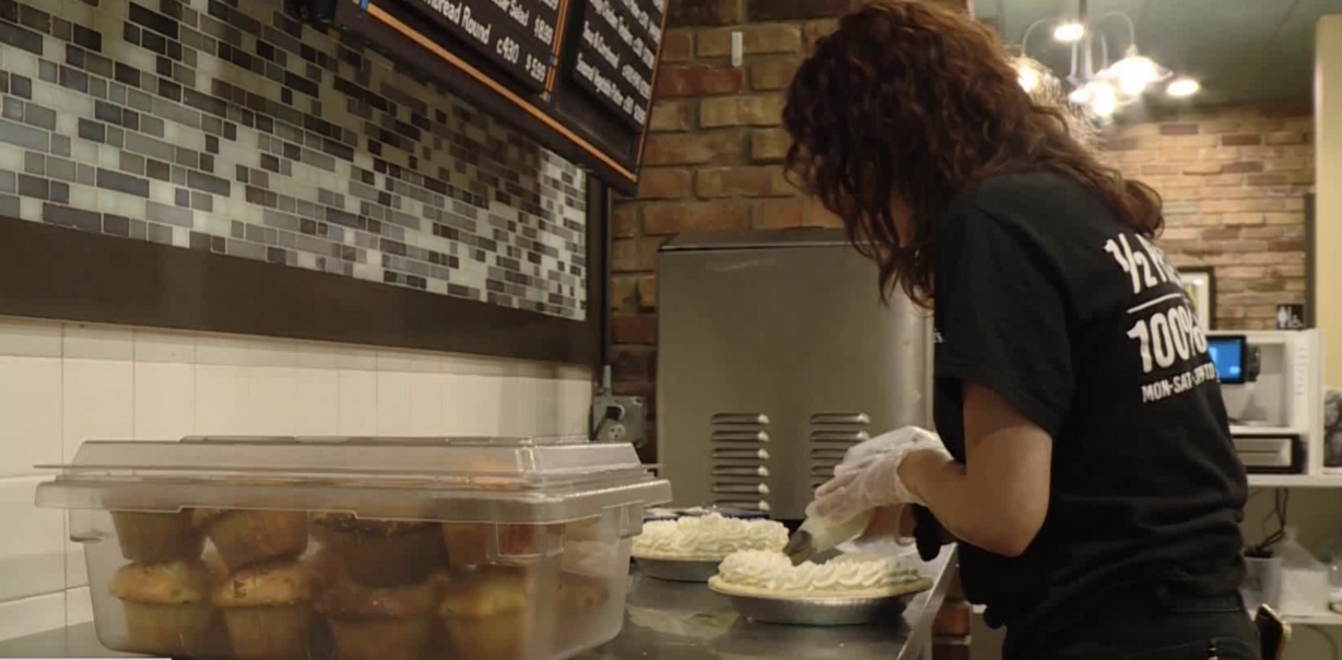 An employee puts whipped cream on top of a pie at Marie Callender's in Millcreek on Monday, Nov. 19, 2019. (Photo: KSL TV)