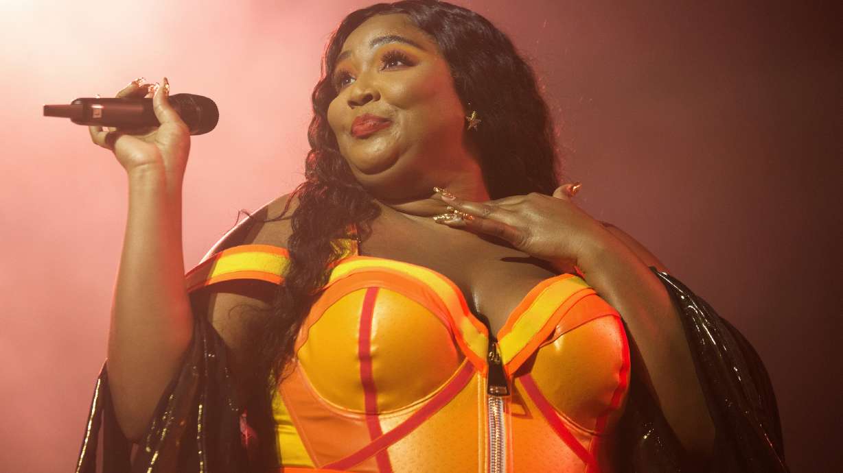 The Latest: Lizzo leads Grammy nominations with 8