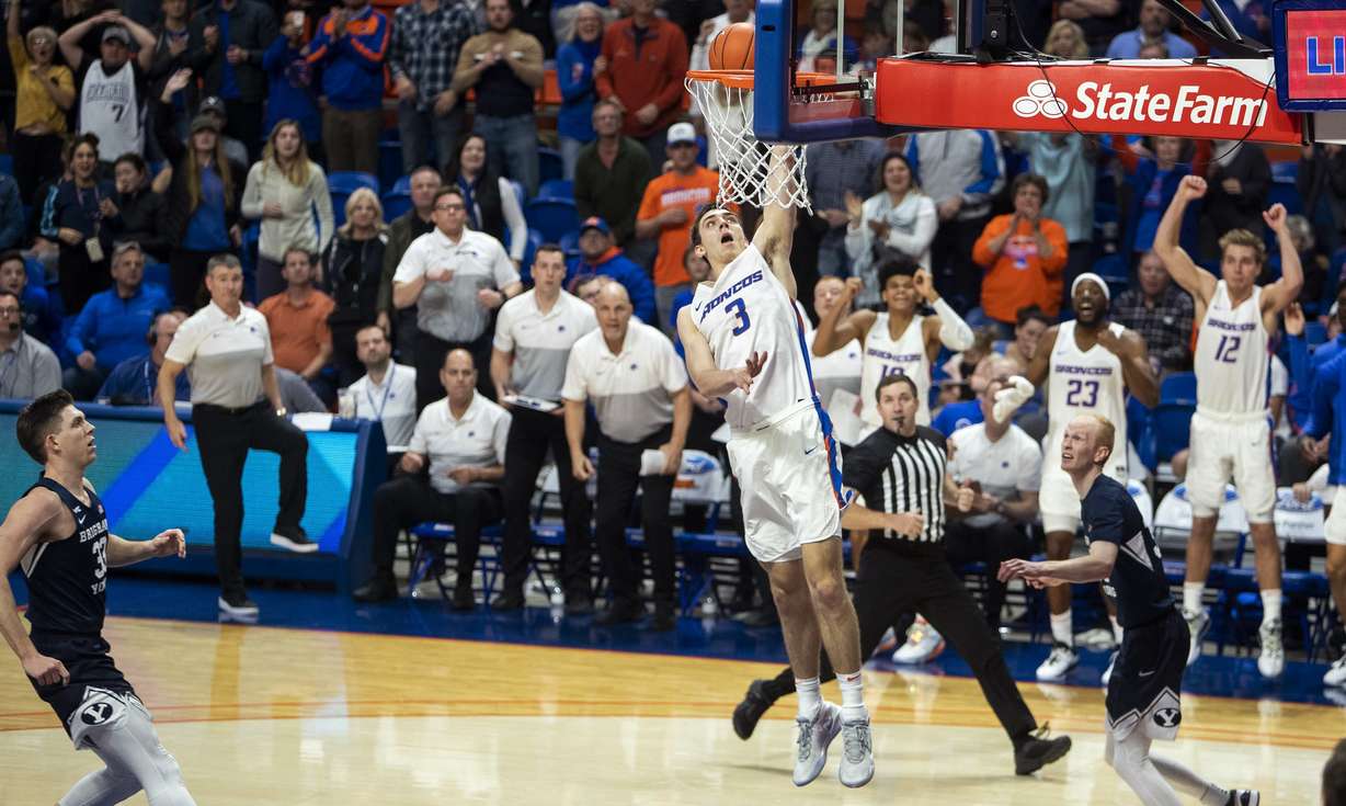Boise State guard Justinian Jessup dunks in overtime against BYU during an NCAA college basketball game Wednesday, Nov. 20, 2019, in Boise, Idaho. Boise State won 72-68. (Darin Oswald/Idaho Statesman via AP)