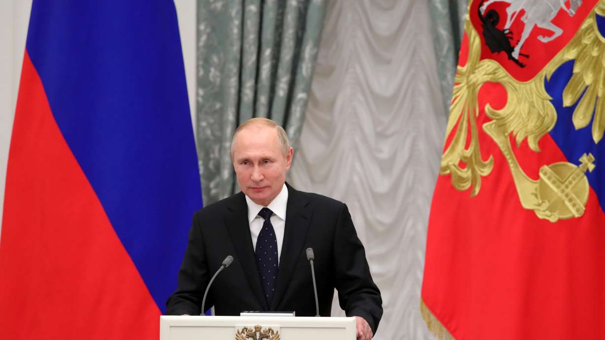 Putin awards widows of experts who died in rocket explosion