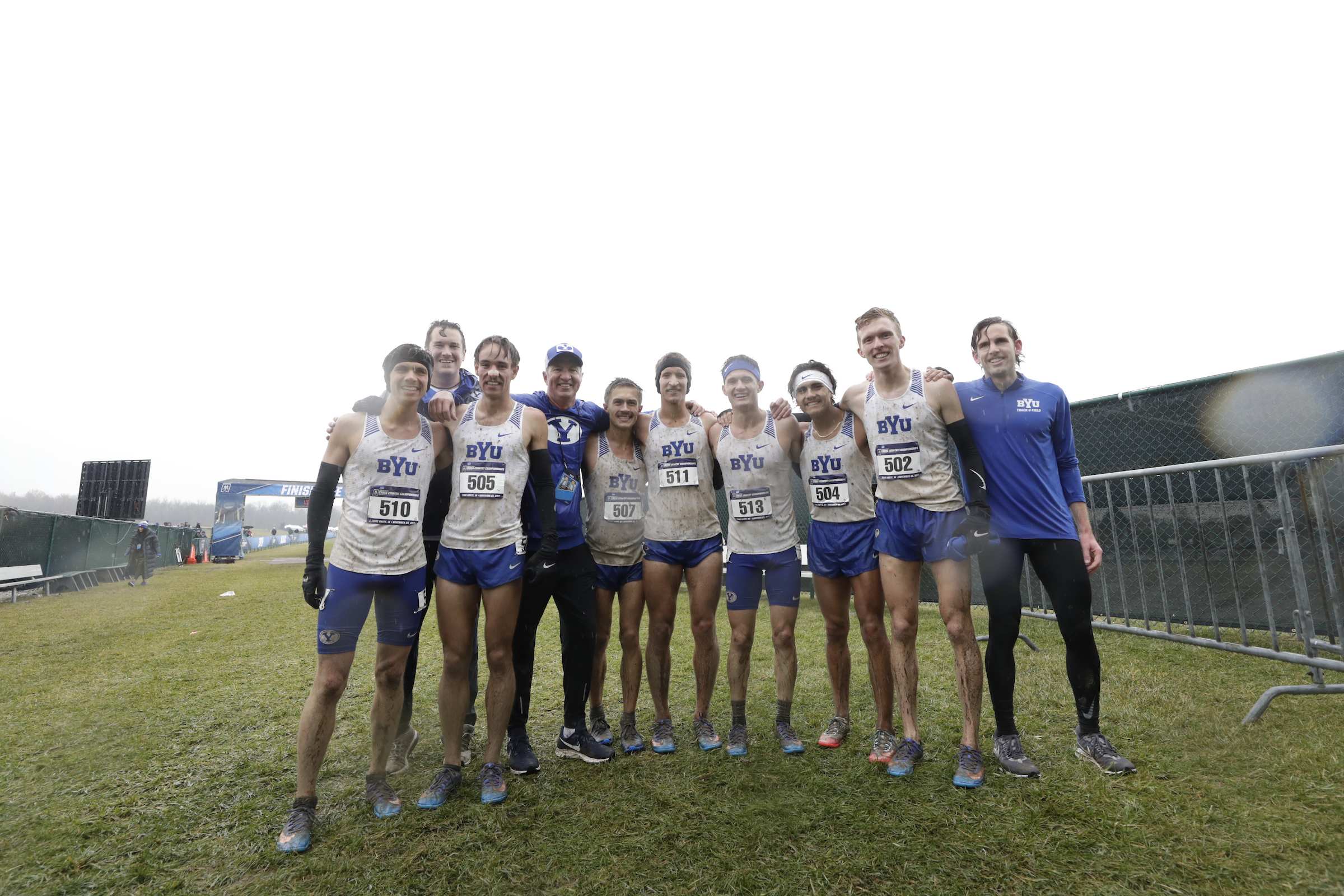 BYU cross country coach Ed Eyestone with his team after the Cougars won the first men's cross country title in program history, Saturday, Nov. 23, 2019 in Terre Haute, Indiana. One of Eyestone's runners, senior Michael Otteson, started his career on the "farm team" before earning a spot on the roster. (Courtesy: BYU Photo)