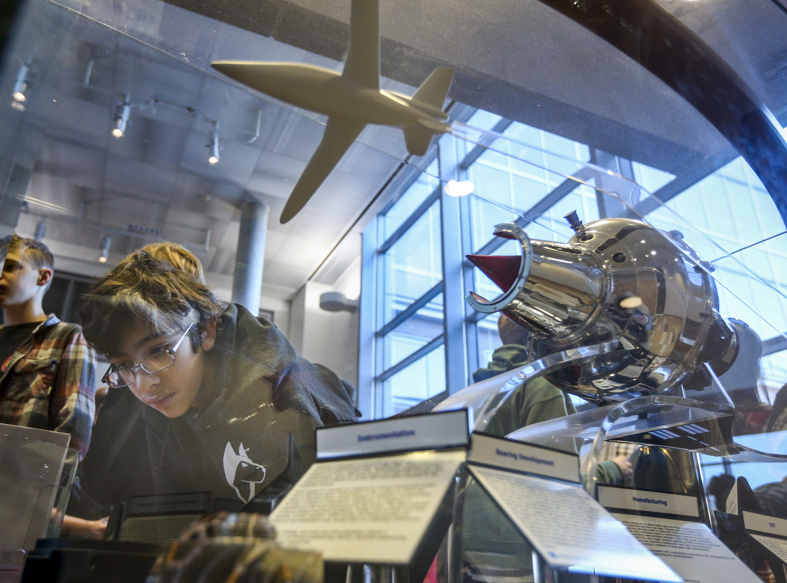 Nicholas Jacob, 16, looks at a display at the civil engineering booth during the University of Utah's annual Engineering Day event on campus in Salt Lake City, Saturday, Nov. 23, 2019. More than 600 students from around the nation registered for the event that gives parents and students an inside look into the different areas of engineering study offered at the university. (Colter Peterson, KSL)