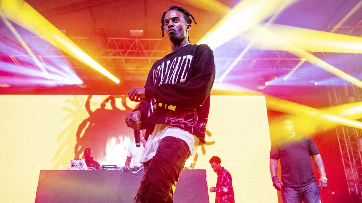 In this June 8, 2018, photo, Playboi Carti performs at the Bonnaroo Music and Arts Festival, in Manchester, Tenn. The rapper was issued a citation and accused of physically assaulting a Utah limo driver on Oct. 2.