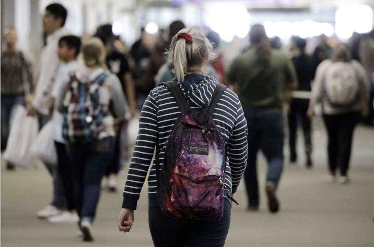 n this Nov. 14, 2019, photo, students walk on the campus of Utah Valley University, in Orem, Utah. More college students are turning to their schools for help with anxiety, depression and other mental health problems. That's according to an Associated Press review of more than three dozen public universities. (AP Photo/Rick Bowmer)