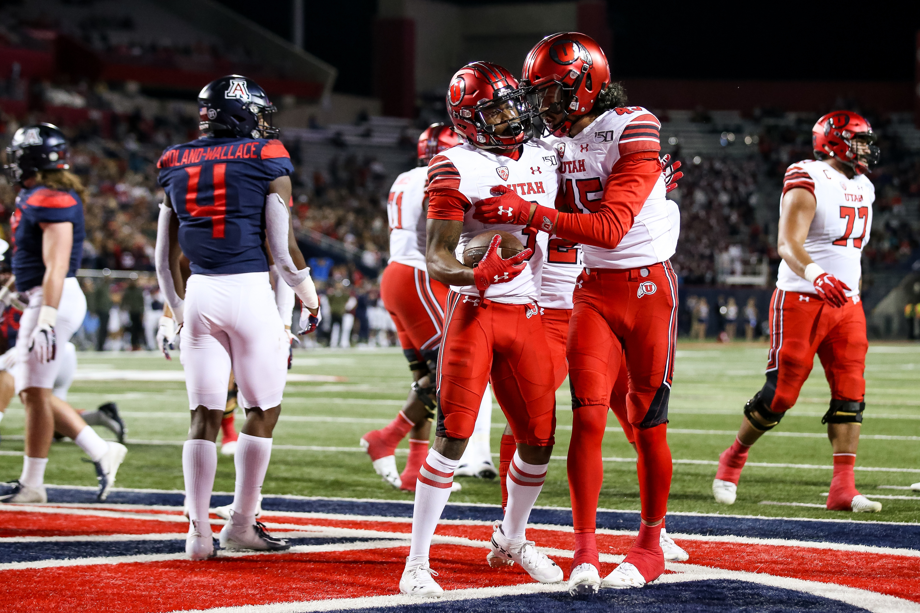 Utah Utes wide receiver Demari Simpkins (3) and wide receiver Samson Nacua (45) celebrate after Simpkins scored Utah's second touchdown, putting the Utes up 14-0 over the Arizona Wildcats after the PAT, at Arizona Stadium in Tucson, Arizona on Saturday, Nov. 23, 2019. (Photo: Spenser Heaps, KSL)