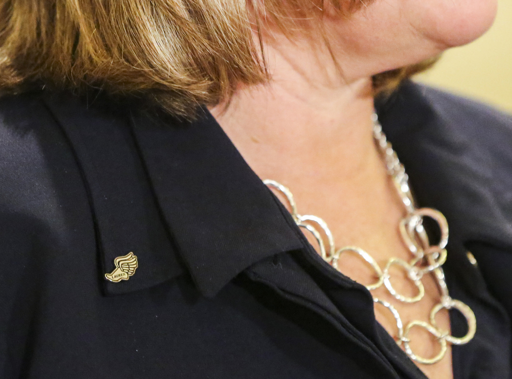 Jill McCluskey wears a running pin with daughter Lauren's name on it during a press conference at the offices of Parker & McConkie in Murray on Monday, Nov. 25, 2019. (Photo: Colter Peterson, KSL)