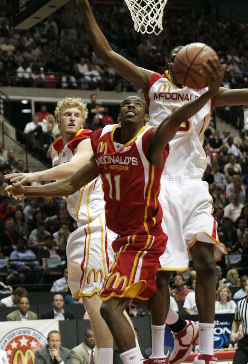 Mike Conley puts up a shot against the defense of Kevin Durant and Chase Budinger, during the 2006 McDonald's All American High School basketball game Wednesday March, 29, 2006 in San Diego. (Jack Smith, AP Photo)