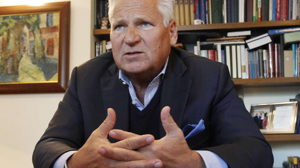 AP Interview: Ex-Polish president defends Biden and Burisma