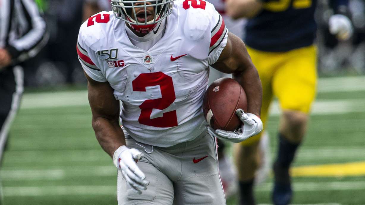 No. 2 Ohio State beats No. 10 Michigan 56-27 for record run
