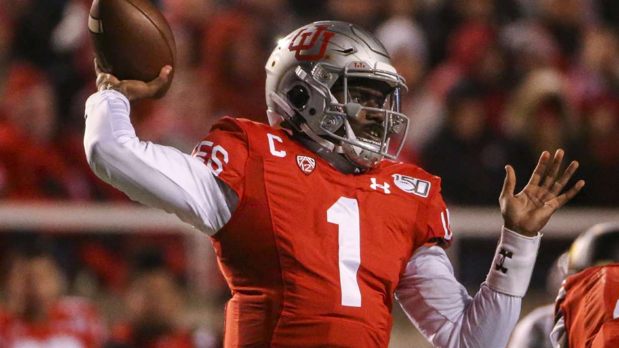 Utah Utes quarterback Tyler Huntley (1) makes a throw during the first half of an NCAA football game at Rice-Eccles Stadium in Salt Lake City on Saturday, Nov. 30, 2019.