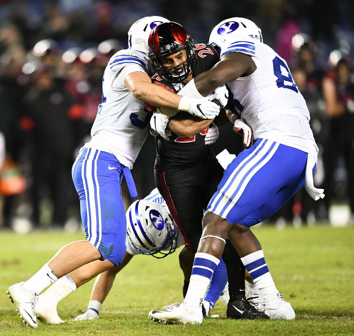 BYU's JJ Nwigwe (right) brings down San Diego State running back Kaegun Williams during the Cougars' 13-3 loss to the Aztecs, Saturday, Nov. 30, 2019 at SDCCU Stadium in San Diego. (Photo: Michael Lu for KSL.com)