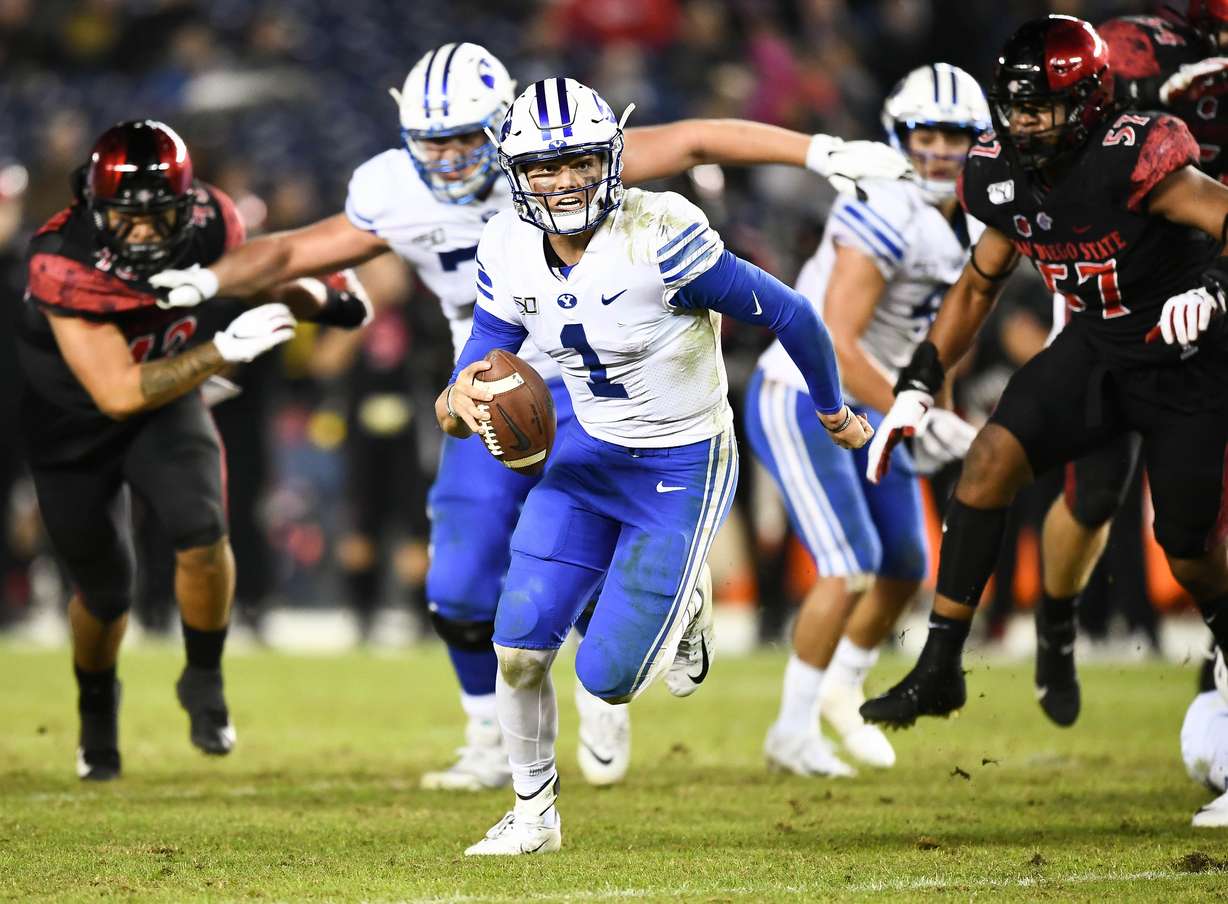BYU quarterback Zach Wilson scrambles for extra yardage during the Cougars' 13-3 loss to San Diego State, Saturday, Nov. 30, 2019 at SDCCU Stadium in San Diego. (Photo: Michael Lu for KSL.com)