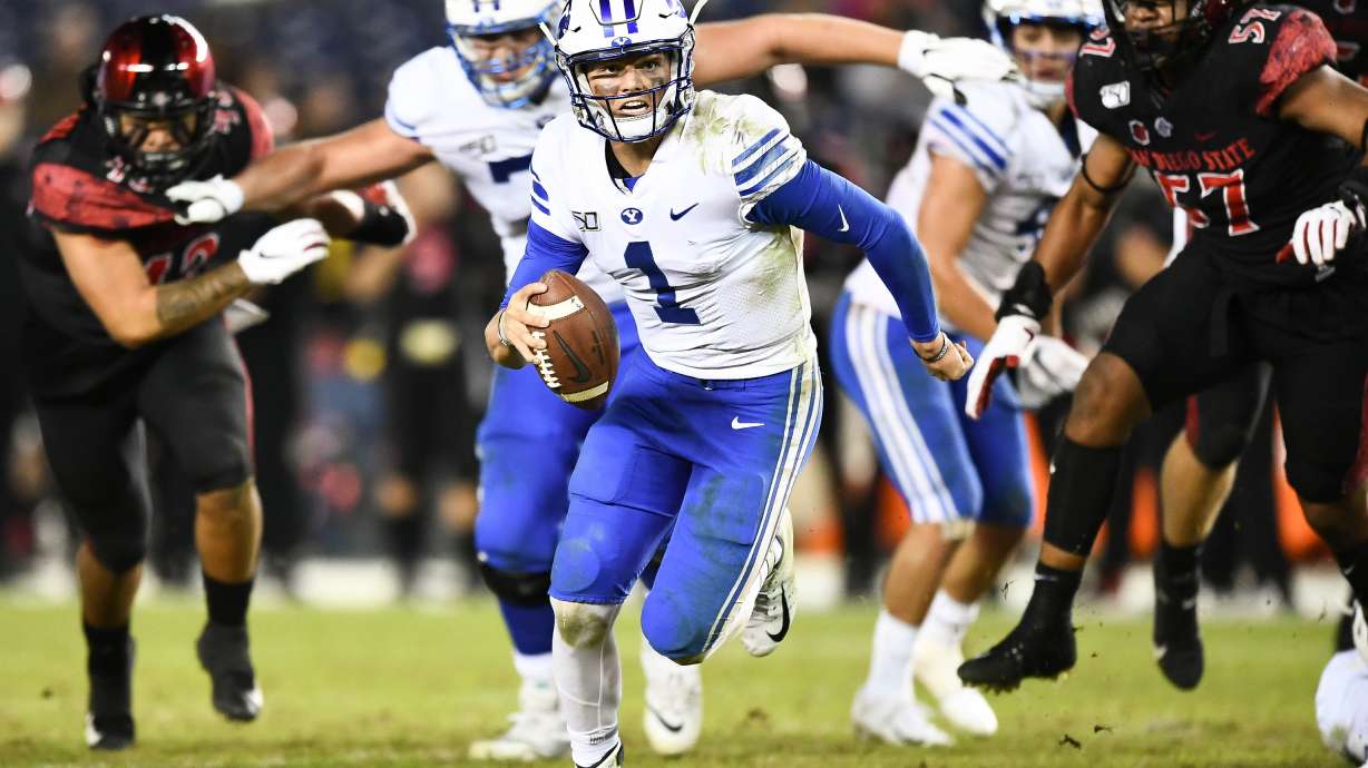 BYU quarterback Zach Wilson scrambles for extra yardage during the Cougars' 13-3 loss to San Diego State, Saturday, Nov. 30, 2019 at SDCCU Stadium in San Diego. (Photo: Michael Lu for KSL.com)