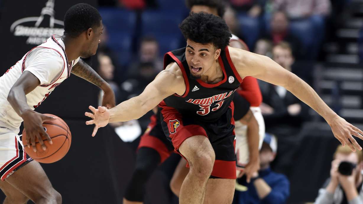 Louisville is new No. 1, unranked Michigan goes to No. 4