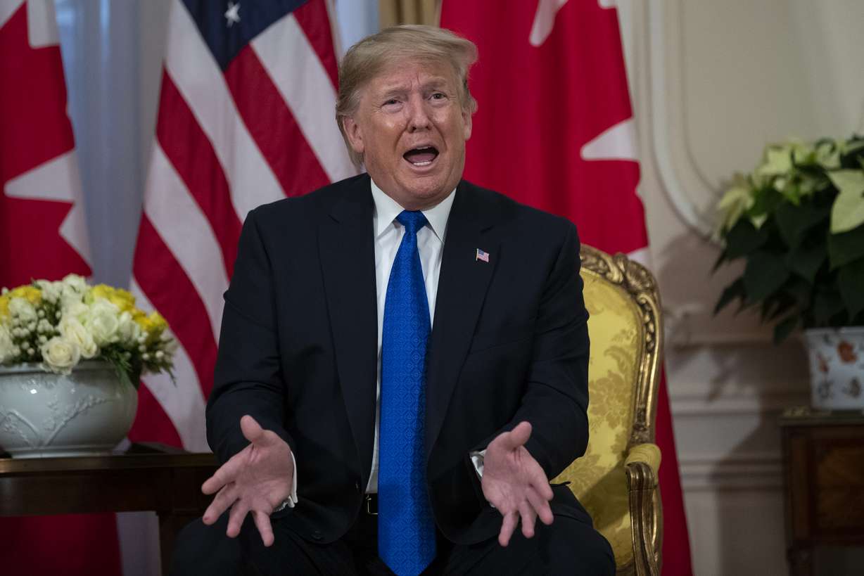 President Donald Trump speaks during a meeting with Canadian Prime Minister Justin Trudeau at Winfield House during the NATO summit, Tuesday, Dec. 3, 2019, in London. (Evan Vucci, AP Photo)