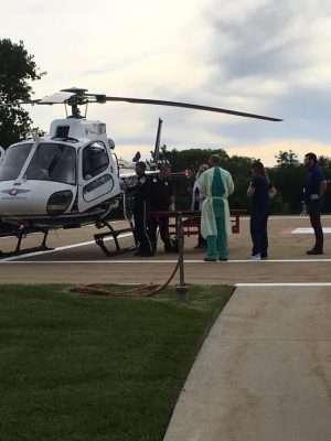 Cannon Cooper arrives via a helicopter at a hospital in June after falling nearly 40 feet into an ice cave. (Photo: Cooper Family)