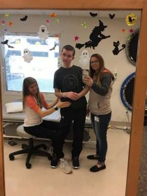 Cannon Cooper works on physical therapy exercises at Primary Children's Hospital in Salt Lake City. (Photo: Cooper Family)