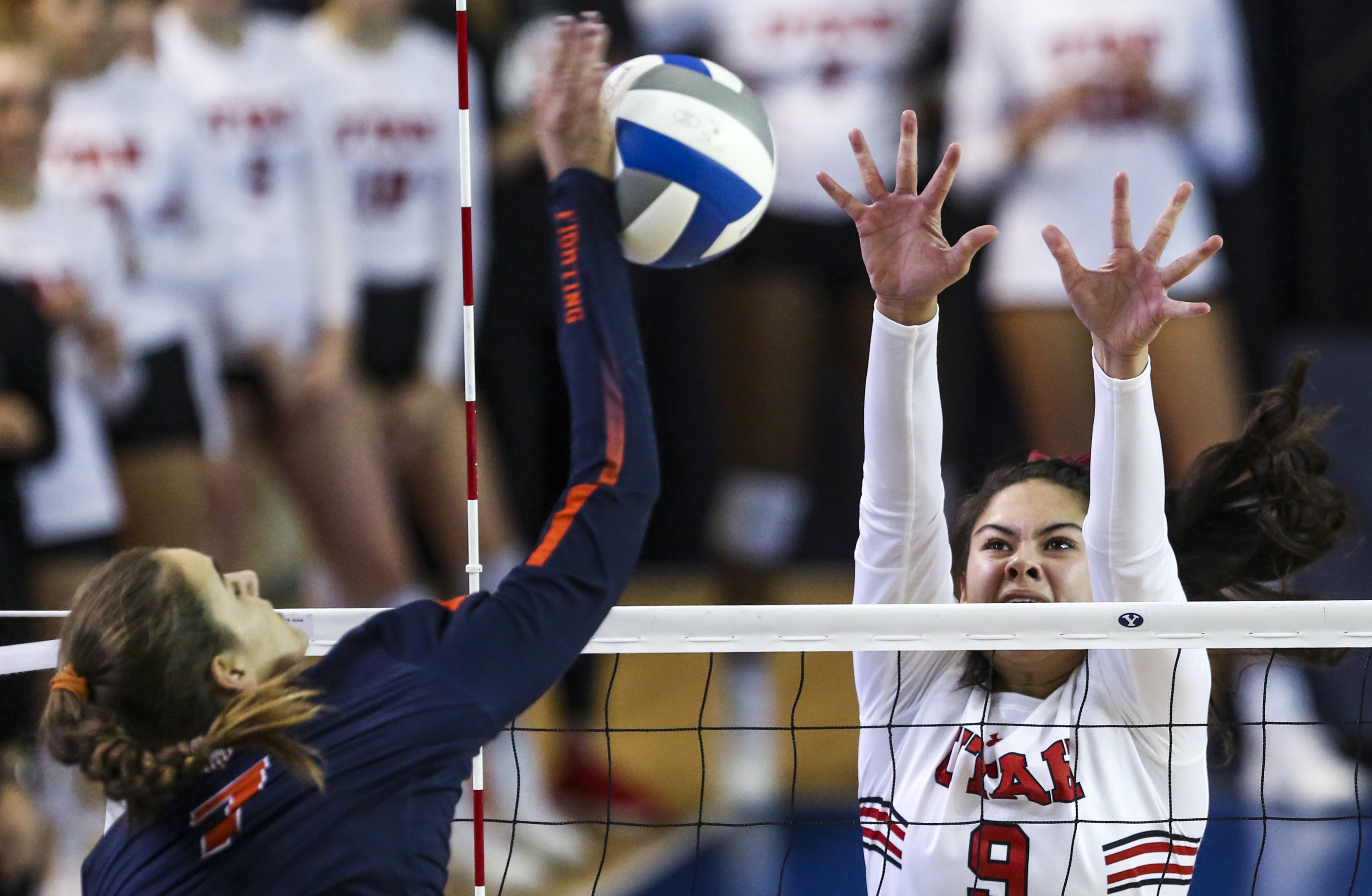 Utah setter Saige Ka'aha'aina-Torres (9) goes up for a block against Illinois outside hitter Jacqueline Quade (7) during the first set of a first round volleyball match in the 2019 NCAA women's volleyball tournament at the Smith Fieldhouse in Provo on Friday, Dec. 6, 2019. (Photo: Colter Peterson, KSL)