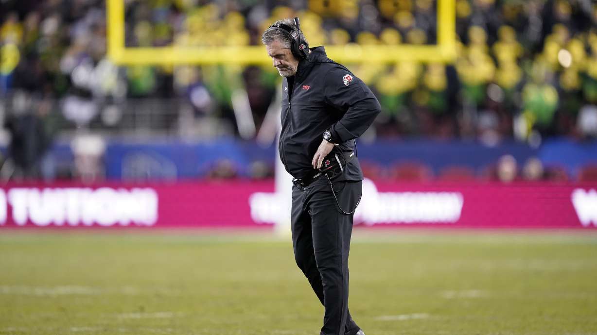 Utah head coach Kyle Whittingham walks the sidelines during a time out against Oregon in the first half of the Pac-12 Conference championship NCAA college football game in Santa Clara, Calif., Friday, Dec. 6, 2018. (AP Photo/Tony Avelar)