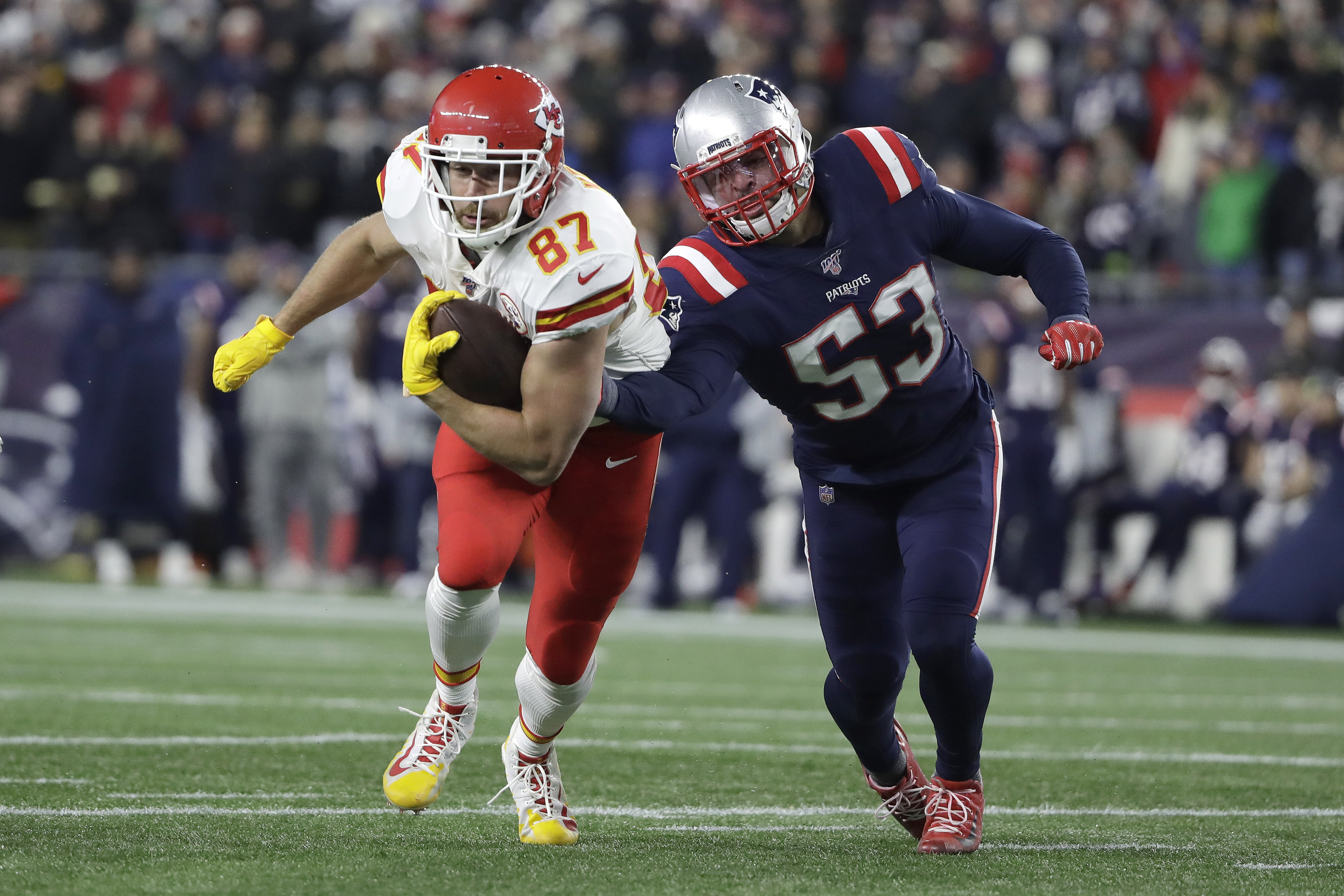 Kansas City Chiefs tight end Travis Kelce runs from New England Patriots linebacker Kyle Van Noy, right, after catching a pass in the first half of an NFL football game, Sunday, Dec. 8, 2019, in Foxborough, Mass. (Photo: Steven Senne, AP)