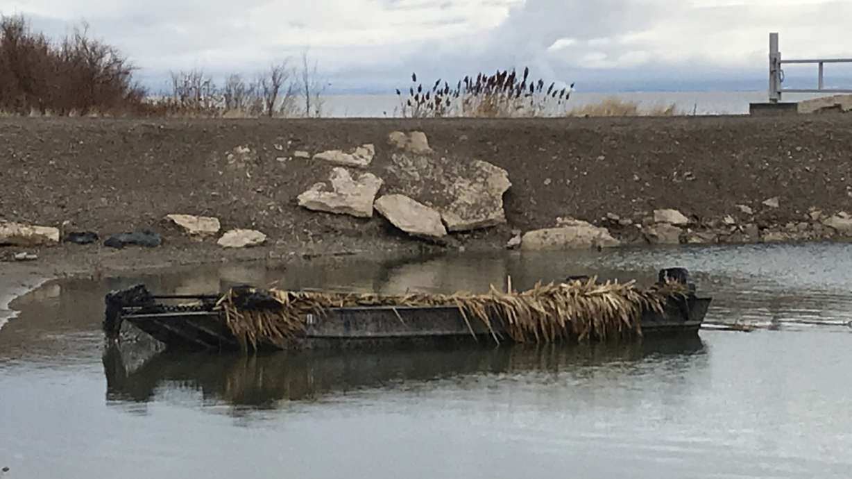 3 men, dog safe after duck hunting boat gets swamped on Utah Lake