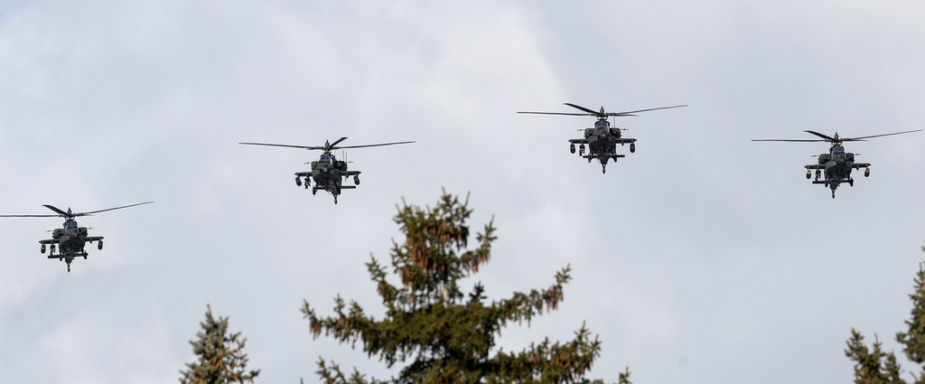 Apache helicopters fly over graveside services for Chief Warrant Officer 2 Kirk T. Fuchigami Jr. at the Brigham City Cemetery on Monday, Dec. 9, 2019. (Photo: Steve Griffin, KSL)