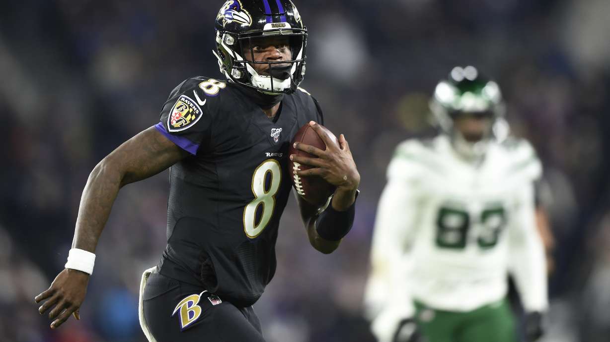 Jackson, Ravens beat Jets 42-21 to clinch AFC North title