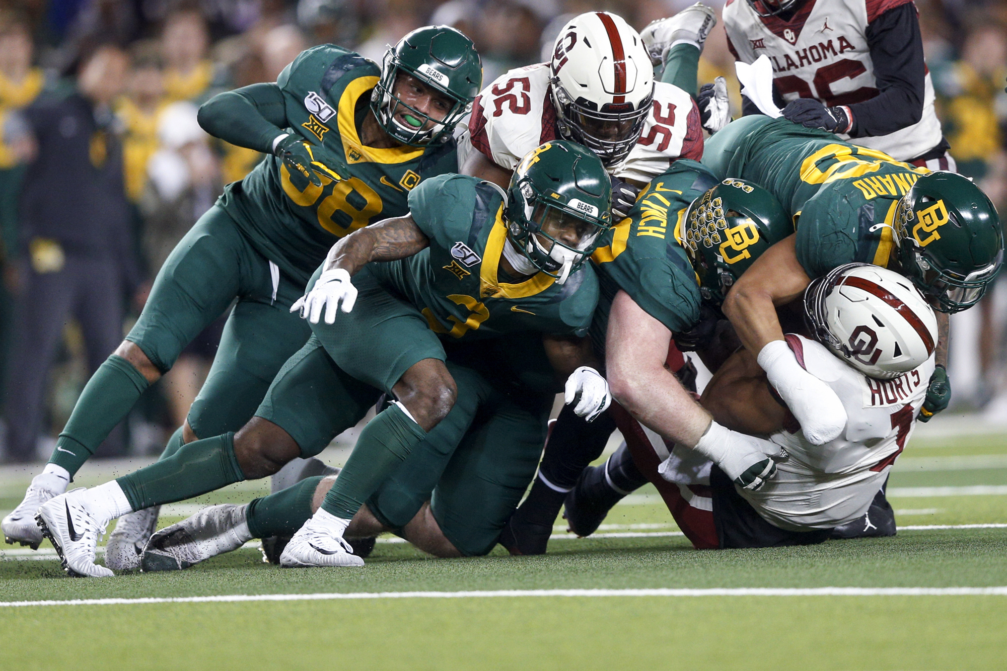 Hubbard, Lynch, Hurts lead AP Big 12 awards; Rhule top coach