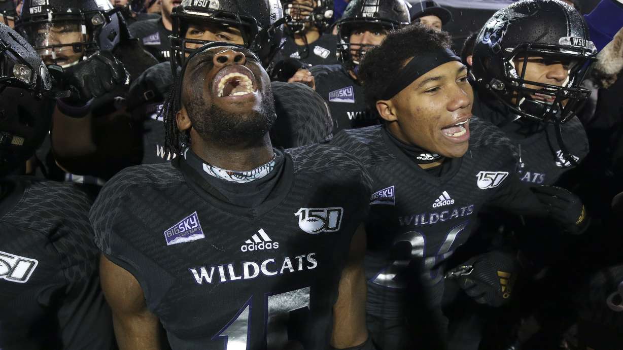 Weber State Wildcats Raoul Johnson (15) celebrate the won over the Montana Grizzlies during the FCS quarterfinals at Stewart Stadium in Ogden on Friday, Dec. 13, 2019. Weber won 17-10.