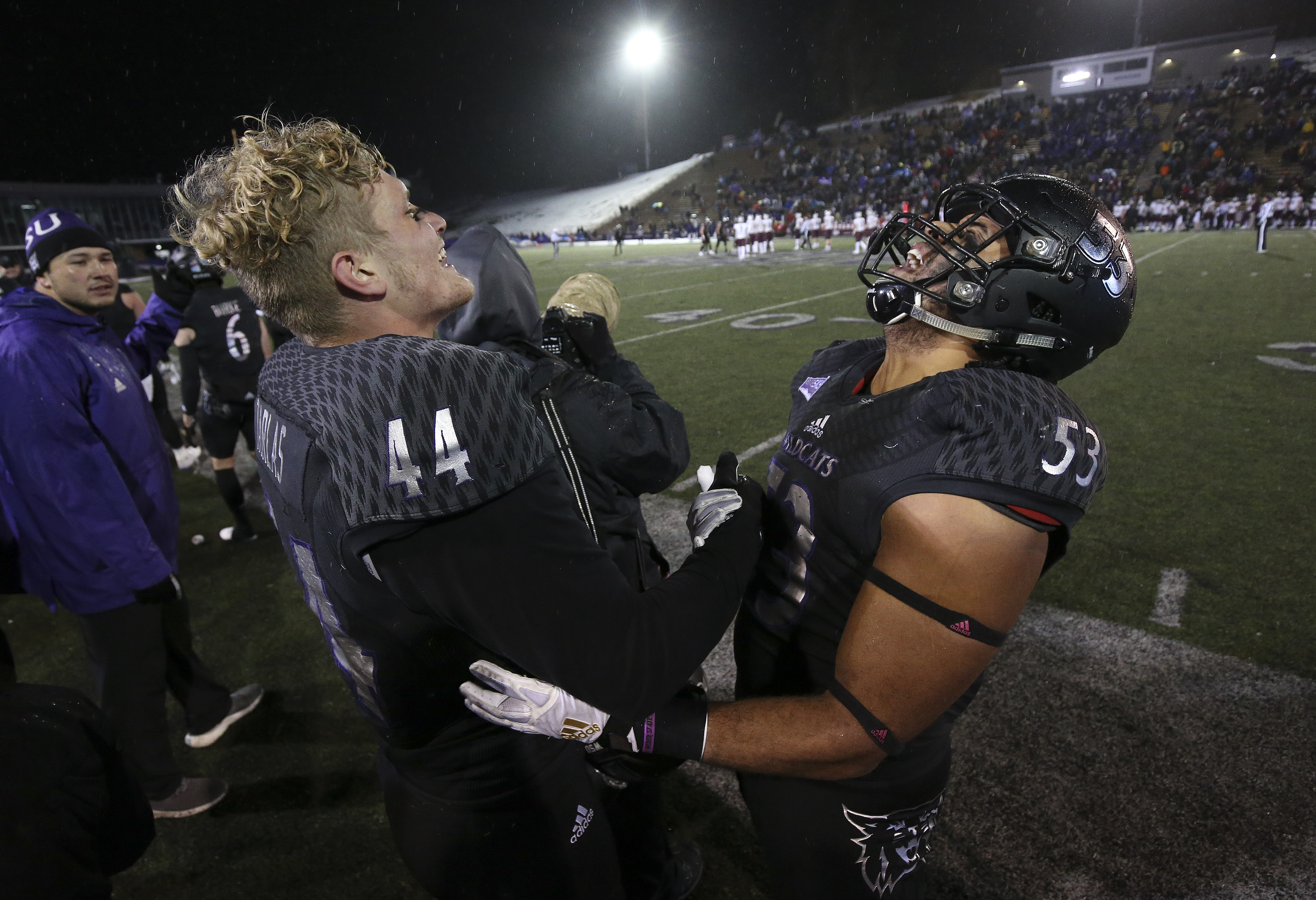 Weber State Wildcats defensive end George Tarlas (44) celebrates his interception at the end of the game with Weber State Wildcats linebacker Auston Tesch (53) during the FCS quarterfinals at Stewart Stadium in Ogden on Friday, Dec. 13, 2019. Weber won 17-10. (Photo: Jeffrey D. Allred, KSL)