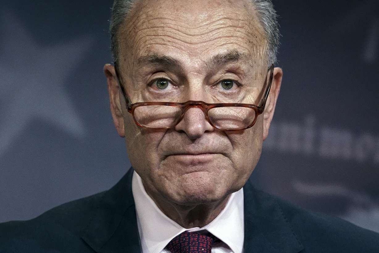 FILE - In this Monday, Dec. 9, 2019, file photo, Senate Minority Leader Chuck Schumer, D-N.Y., speaks to reporters on Capitol Hill in Washington. Photo: J. Scott Applewhite, AP Photo