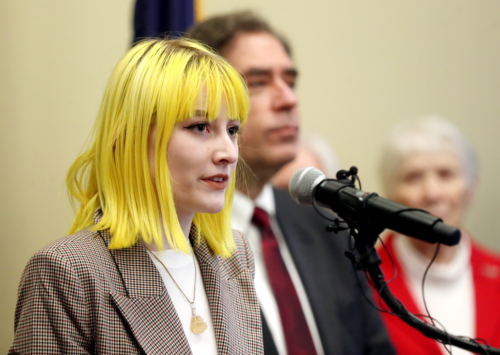 Ainsley Moench, for March For Our Lives Utah, joins Rep. Brian King, D-Salt Lake City, as he holds a press conference at the Capitol to discuss the importance and urgency of passing legislation to require background checks for all firearm sales in the 2020 Legislature in Salt Lake City on Tuesday, Dec. 17, 2019. (Photo: Scott G. Winterton, KSL)