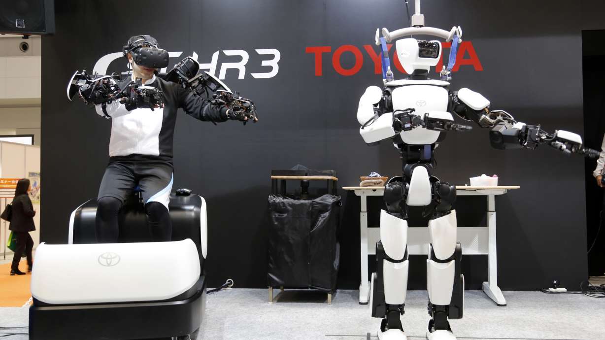 Toyota unveils upgraded version of its humanoid robot