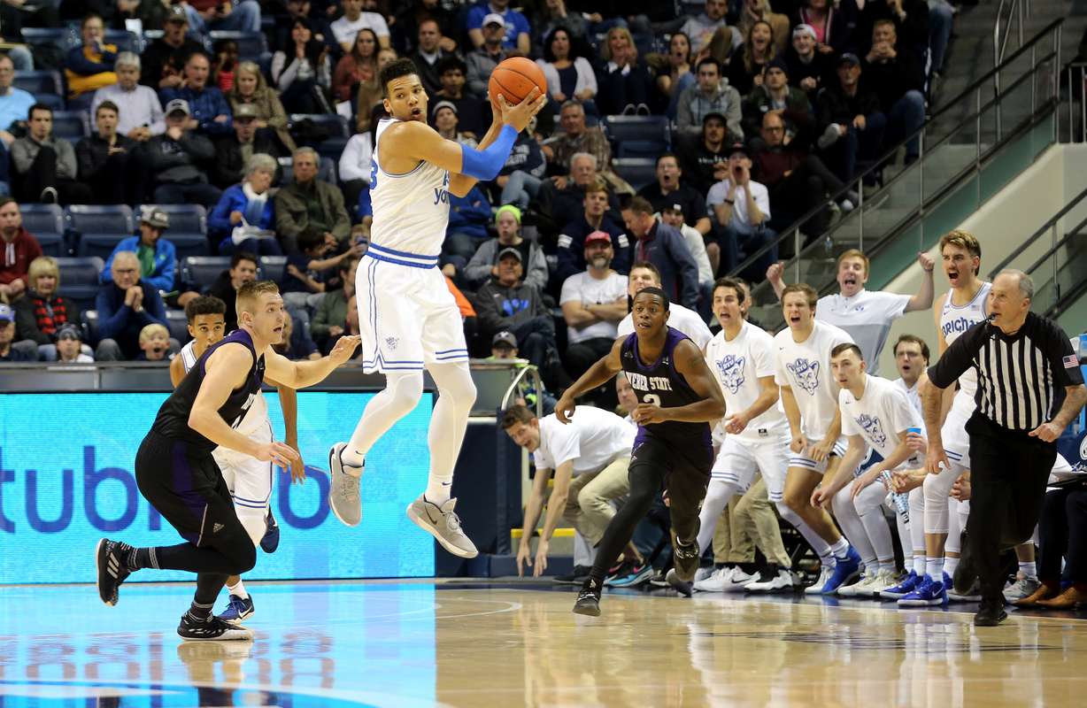 Brigham Young Cougars forward Yoeli Childs (23) comes down with the ball after blocking a 3-point attempt as BYU and Weber State play an NCAA basketball game at the Marriott Center in Provo on Saturday, Dec. 21, 2019. (Photo: Scott G Winterton, KSL)