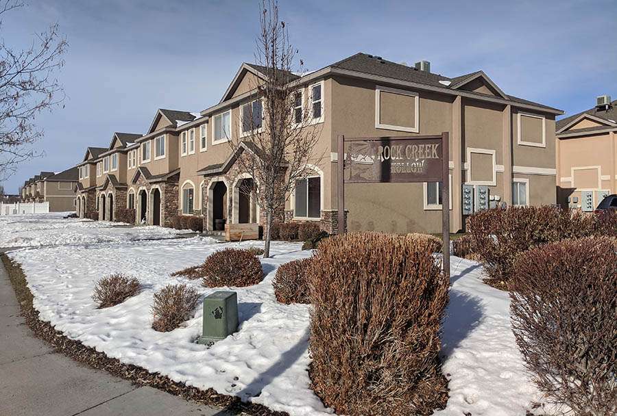 The townhomes located at 565 Pioneer Road in Rexburg where police conducted a welfare check and served a search warrant in connection to the missing person cases of Joshua Vallow and Tylee Ryan. (Photo: Eric Grossarth, EastIdahoNews.com)