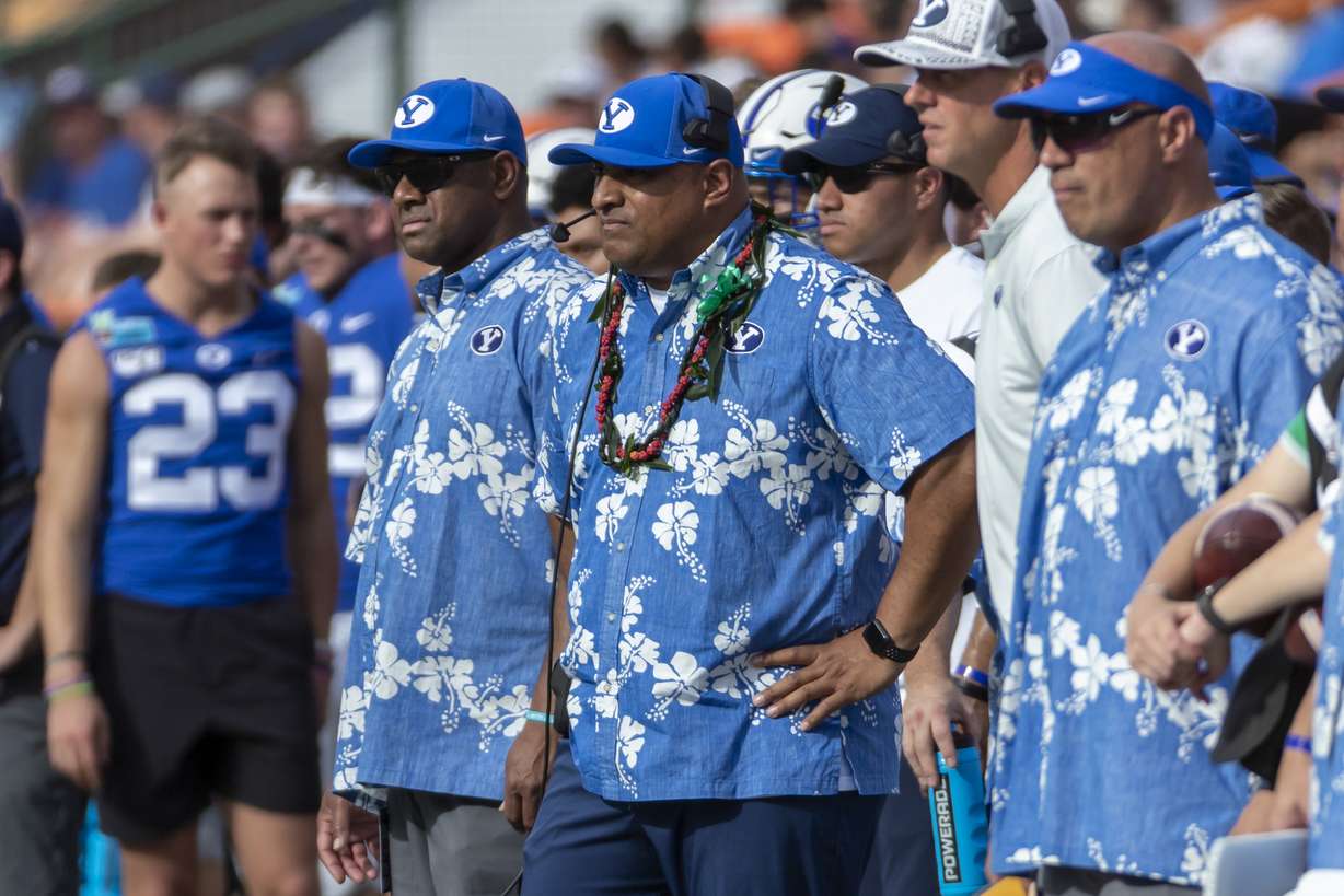 BYU coach Kalani Sitake, center, watches during the first half of the team's Hawaii Bowl NCAA college football game against Hawaii, Tuesday, Dec. 24, 2019, in Honolulu. (Photo: Eugene Tanner, AP)