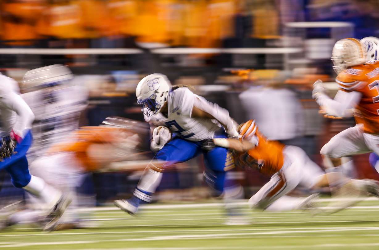 Orem Tigers running back Noah Sewell (2) runs the ball during the first half of the 5A state high school football game at Rice-Eccles Stadium in Salt Lake City on Friday, Nov. 22, 2019. (Photo: Colter Peterson, KSL)