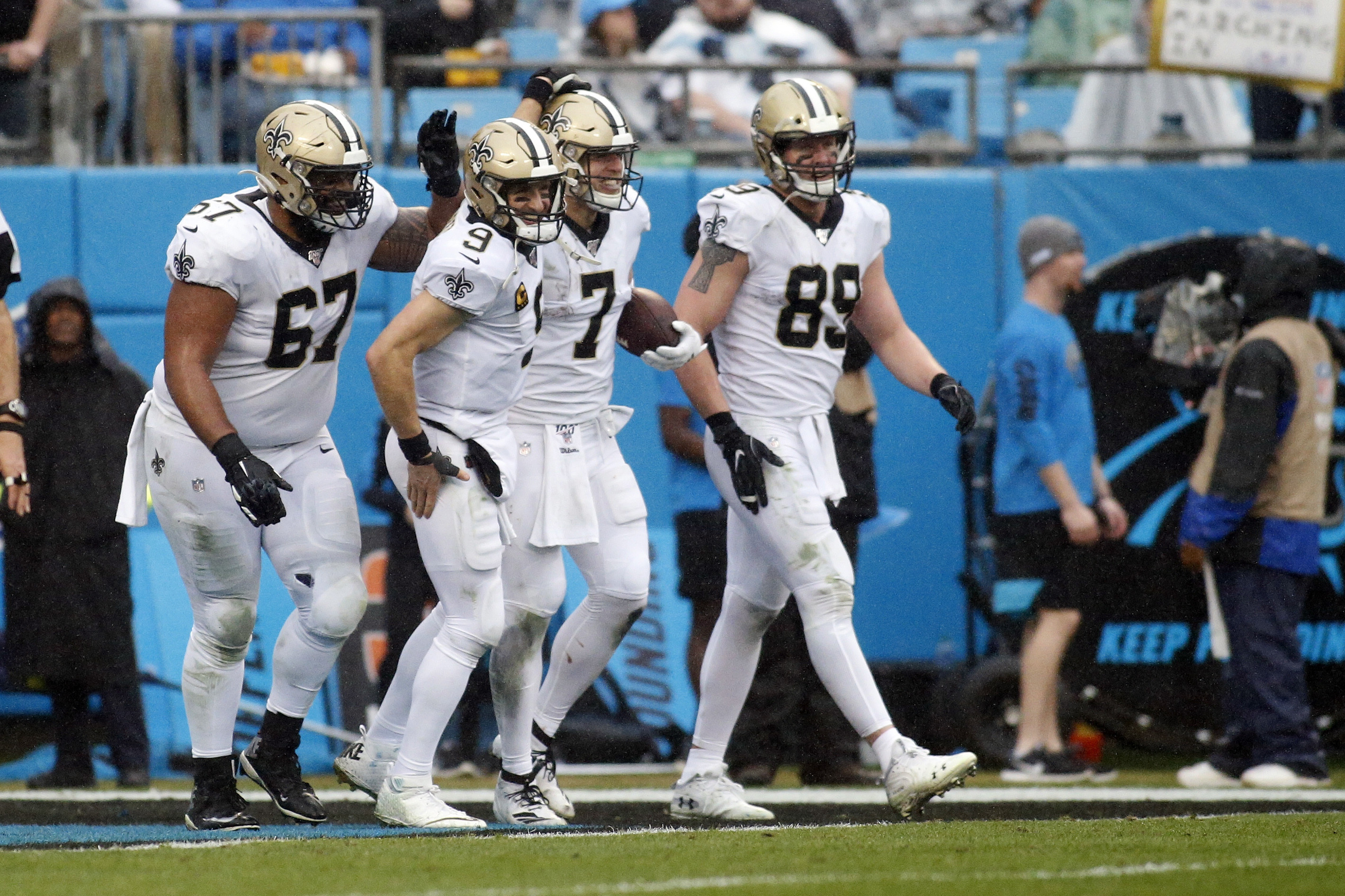 New Orleans Saints quarterback Taysom Hill (7) is congratulated following Hill's touchdown by offensive guard Larry Warford (67), quarterback Drew Brees (9) and tight end Josh Hill (89) during the second half of an NFL football game against the Carolina Panthers in Charlotte, N.C., Sunday, Dec. 29, 2019. (Photo: Brian Blanco, AP)