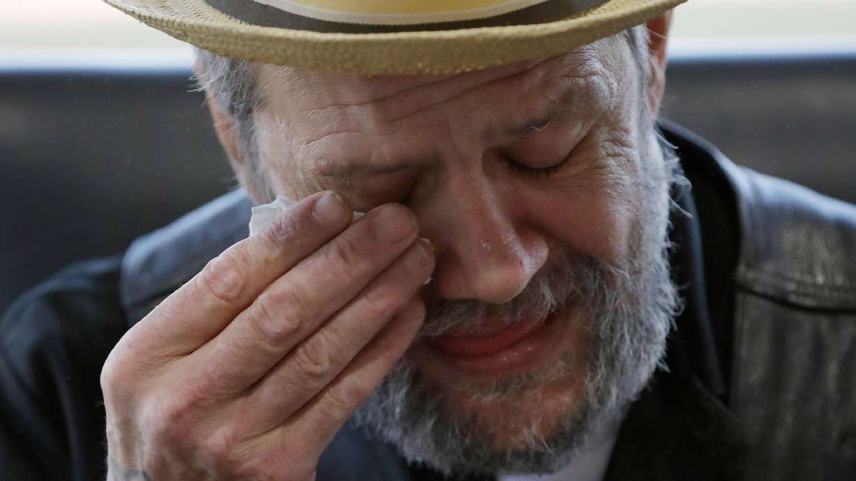 Lawsuit: Famed Jesuit abused boy 1,000 times around world