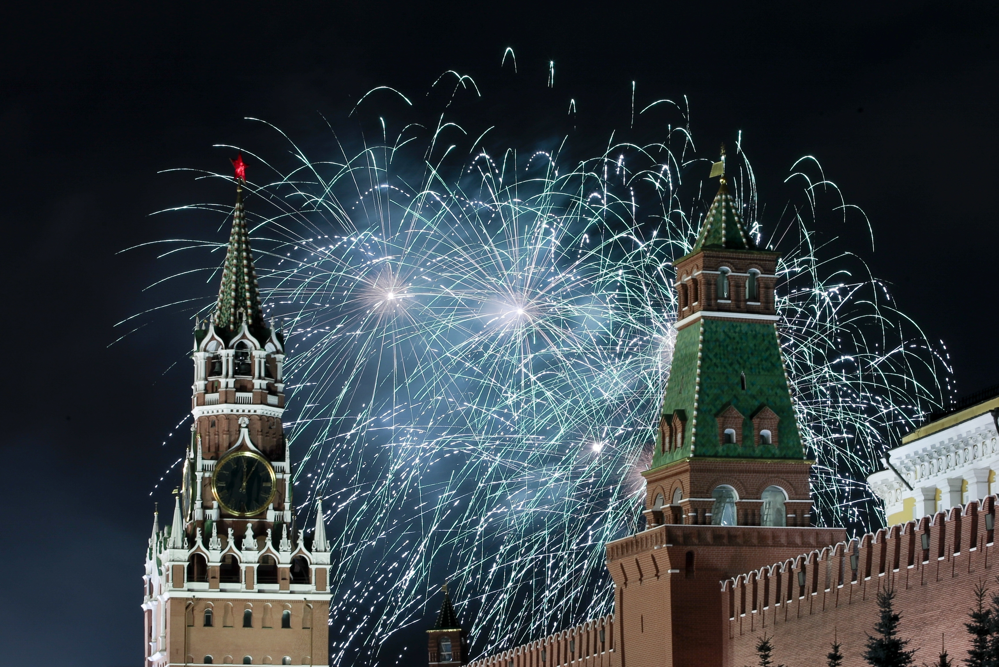 Fireworks explode over the Kremlin during New Year's celebrations in Red Square with the Spasskaya Tower, left, in the background in Moscow, Russia, Wednesday, Jan. 1, 2020. Russians began the world's longest continuous New Year's Eve with fireworks and a message from President Vladimir Putin urging them to work together in the coming year. (Denis Tyrin, AP Photo)