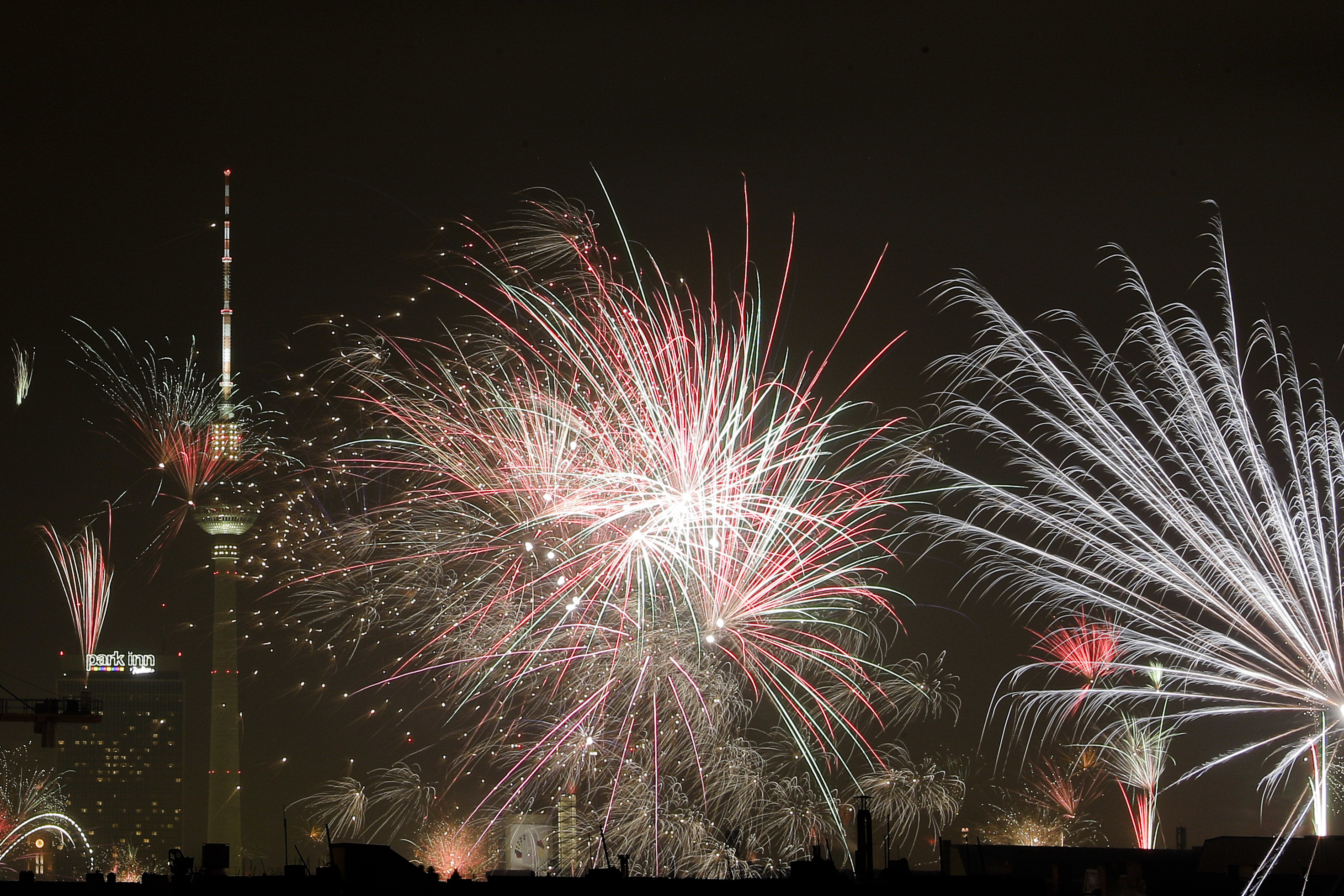 Fireworks light the sky near the Television Tower during New Year celebrations in Berlin, Wednesday, Germany, Jan. 1, 2020. (Markus Schreiber, AP Photo)