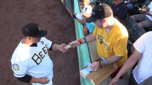 Paul Jones collects autographs at a Salt Lake Bees game. (Photo: KSL TV)