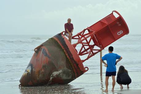Bye-bye buoy: Large beacon removed from Florida beach