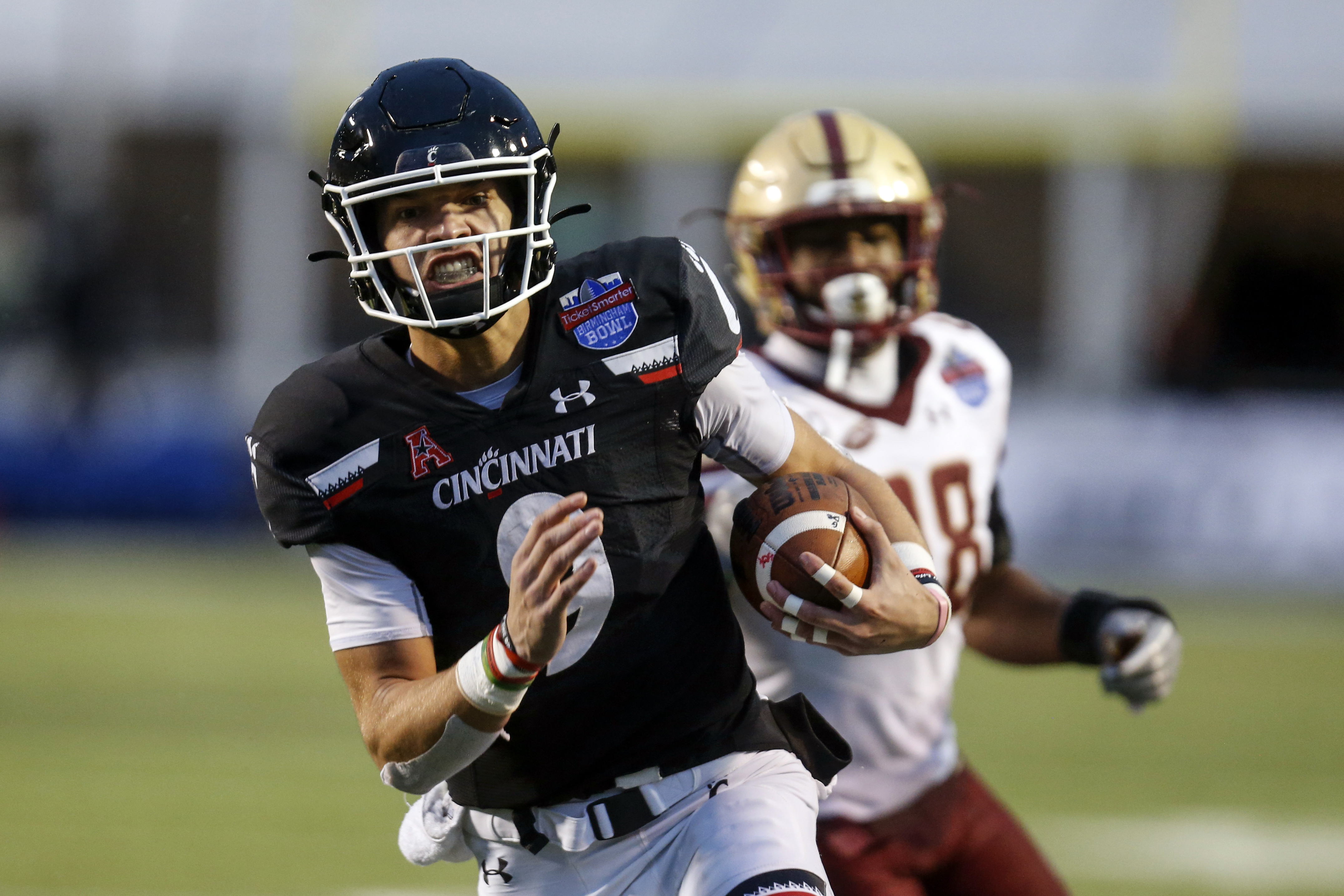 Ridder, No. 23 Cincinnati romp over Boston College, 38-6