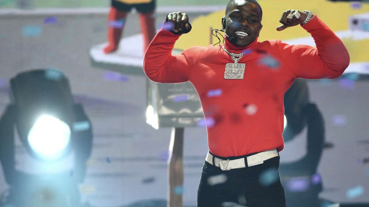 In this June 23, 2019 photo, DaBaby performs "Sugar" at the BET Awards in Los Angeles. A new report determined the rapper's lyrics contain the highest percentage of swears than any other artist represented on Spotify's top 200 songs list.