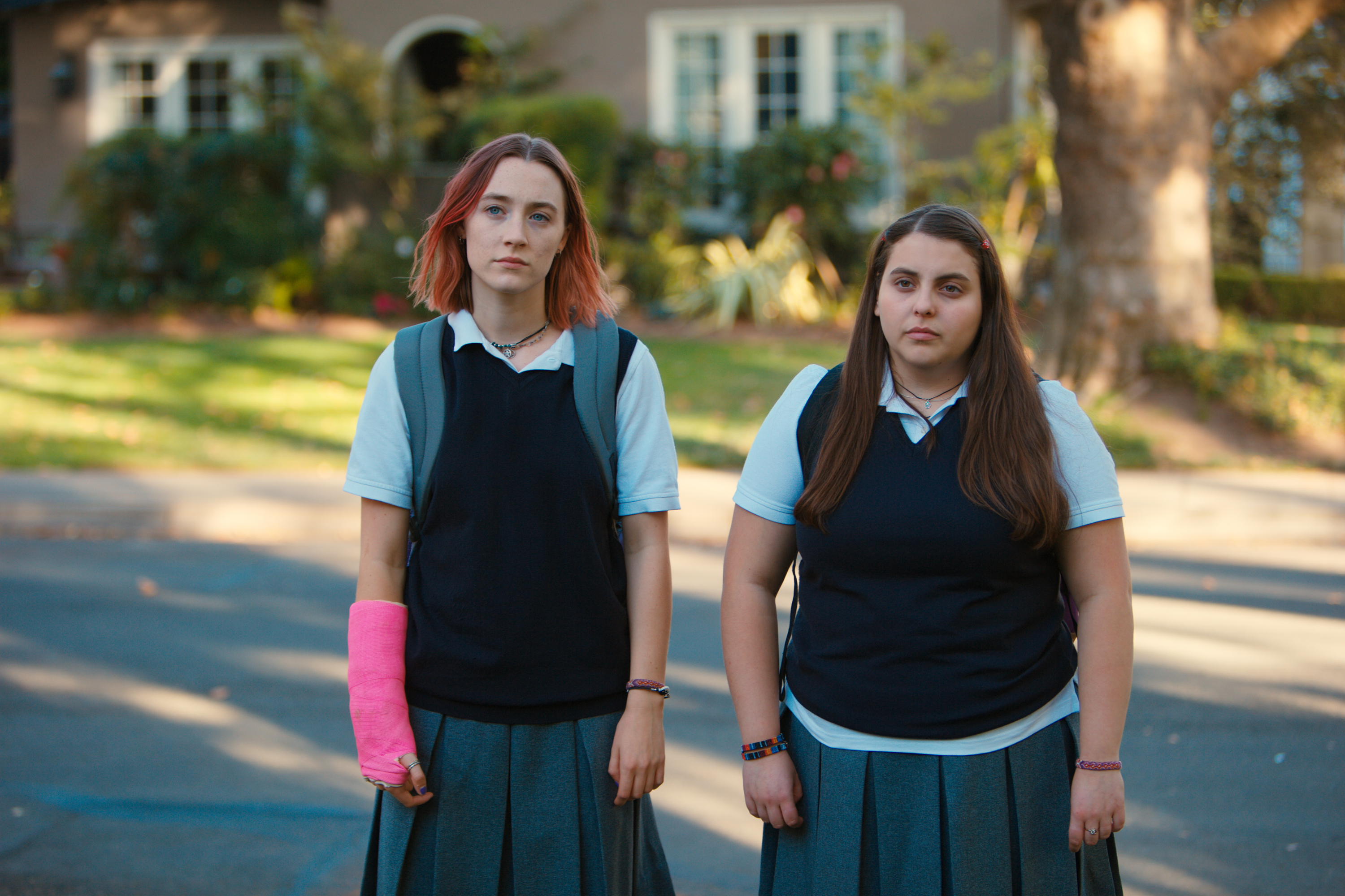 This file image released by A24 Films shows Saoirse Ronan, left, and Beanie Feldstein in a scene from "Lady Bird." Ronan says she hopes that her latest film “Lady Bird” helps people to feel understood in the same way HBO show “Girls” helped her. Her performance has earned her some of the best reviews of her career and could result in a third Oscar nomination for the 23-year-old Irish actress. (Merie Wallace/A24 via AP, File)