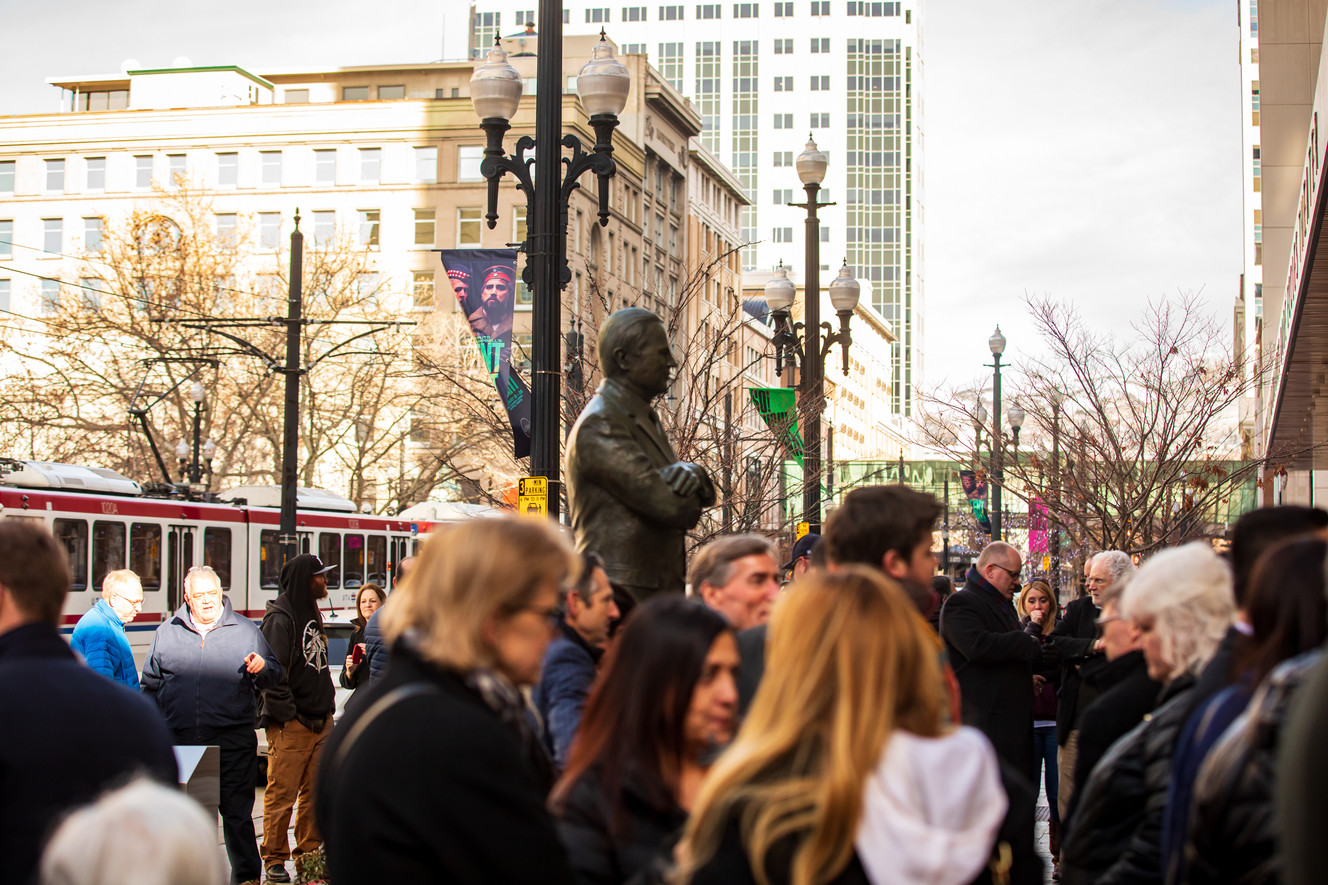 The Vasilios Priskos statue stands over a crowd of people on Main Street Salt Lake City on Friday, Jan. 3, 2020. (Photo: Carter Williams, KSL.com)