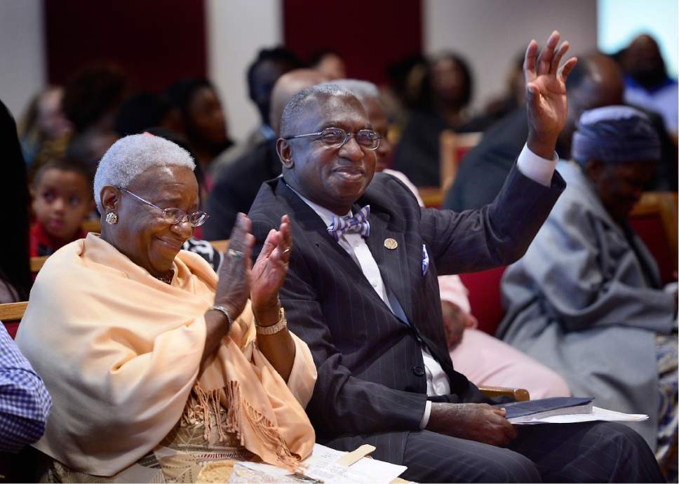 Pastor France Davis (right) and his wife, Willene Davis (left), wave to the camera at the Calvary Baptist Church. (Photo: Courtesy of Willene Davis Personal Collection)